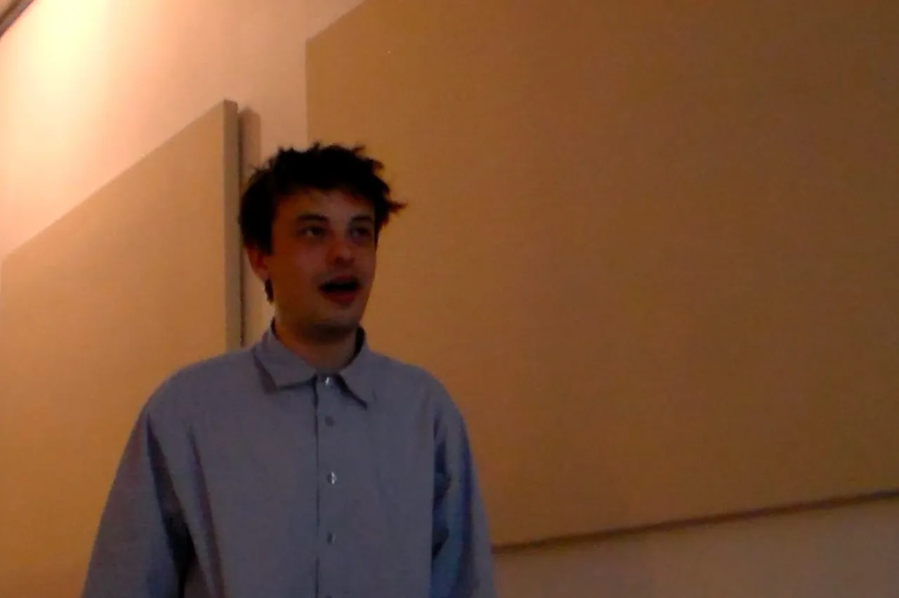 A speaker presenting a Bogathon project.